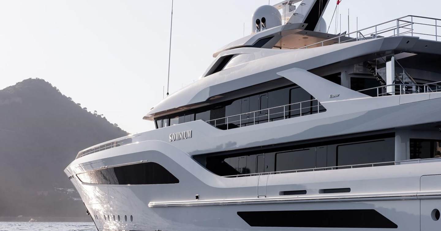 Close up of Superyacht Somnium port side while under way 