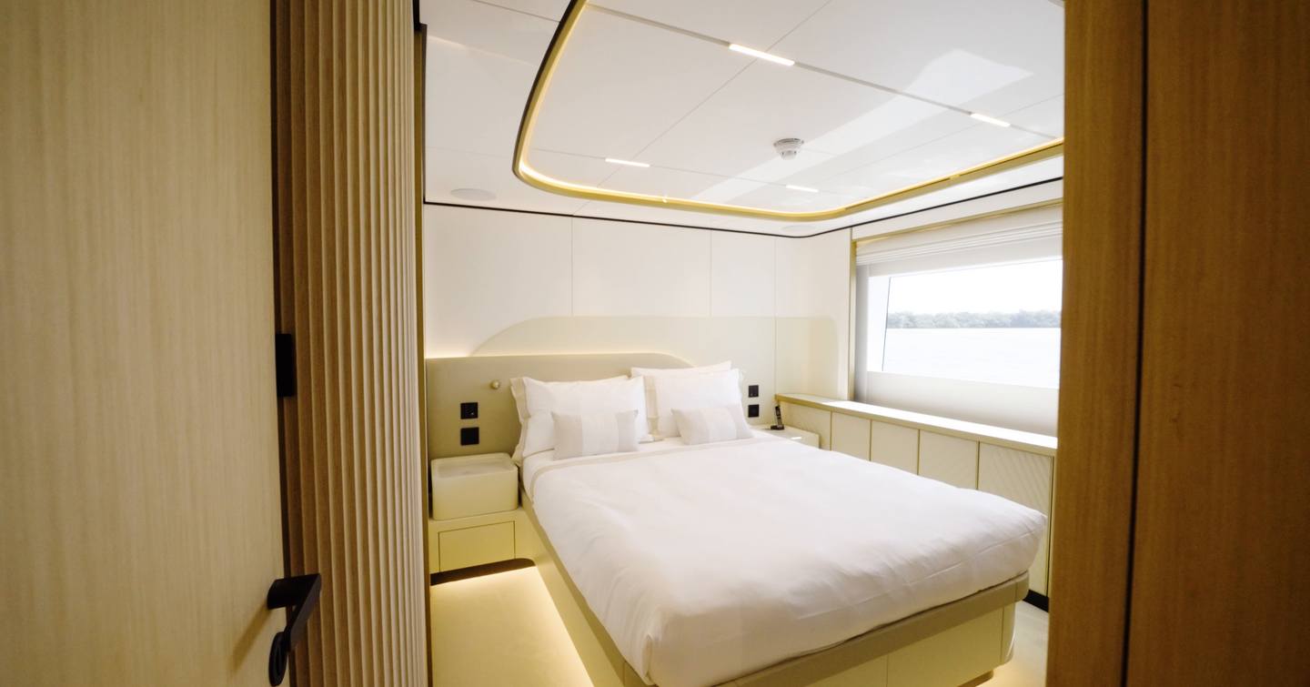 Double guest cabin aboard the Gulf Craft Majesty 100 Terrace with panoramic hull window
