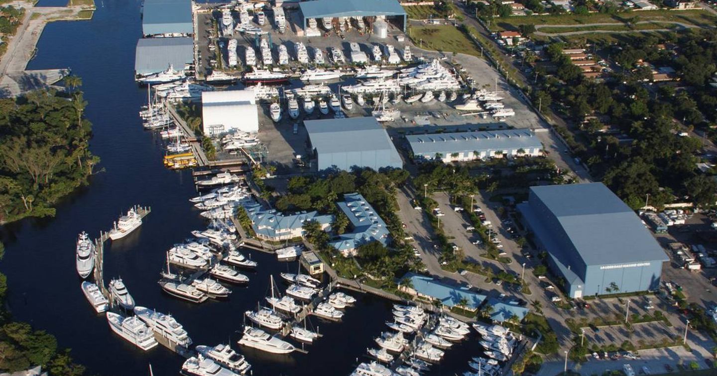 Aerial view of Lauderdale Marine Center (LMC) , surrounded by green foliage and river