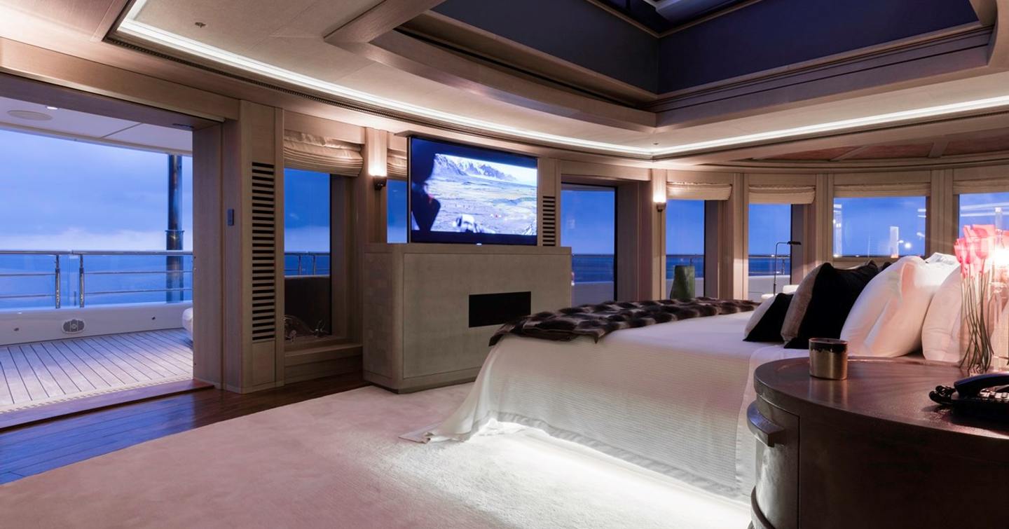 Superyacht Luna's master cabin with pop up TV and private terrace