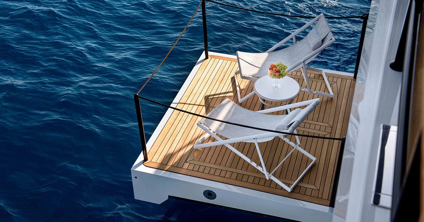 Lazzara LPC 300 Catamaran master cabin fold out balcony with deck chairs