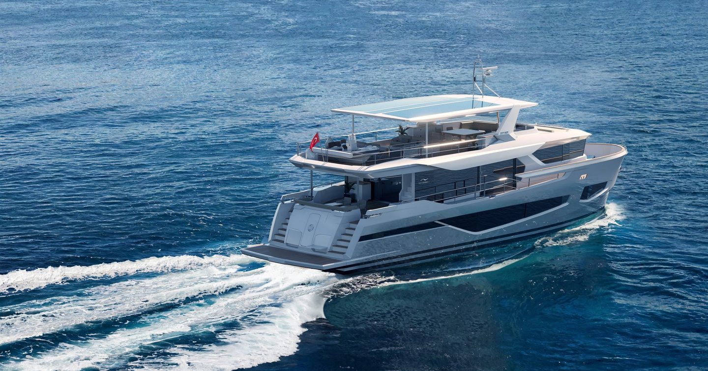 Motor yacht 27Xp rear view, with aft deck amenities such as a table and sofa