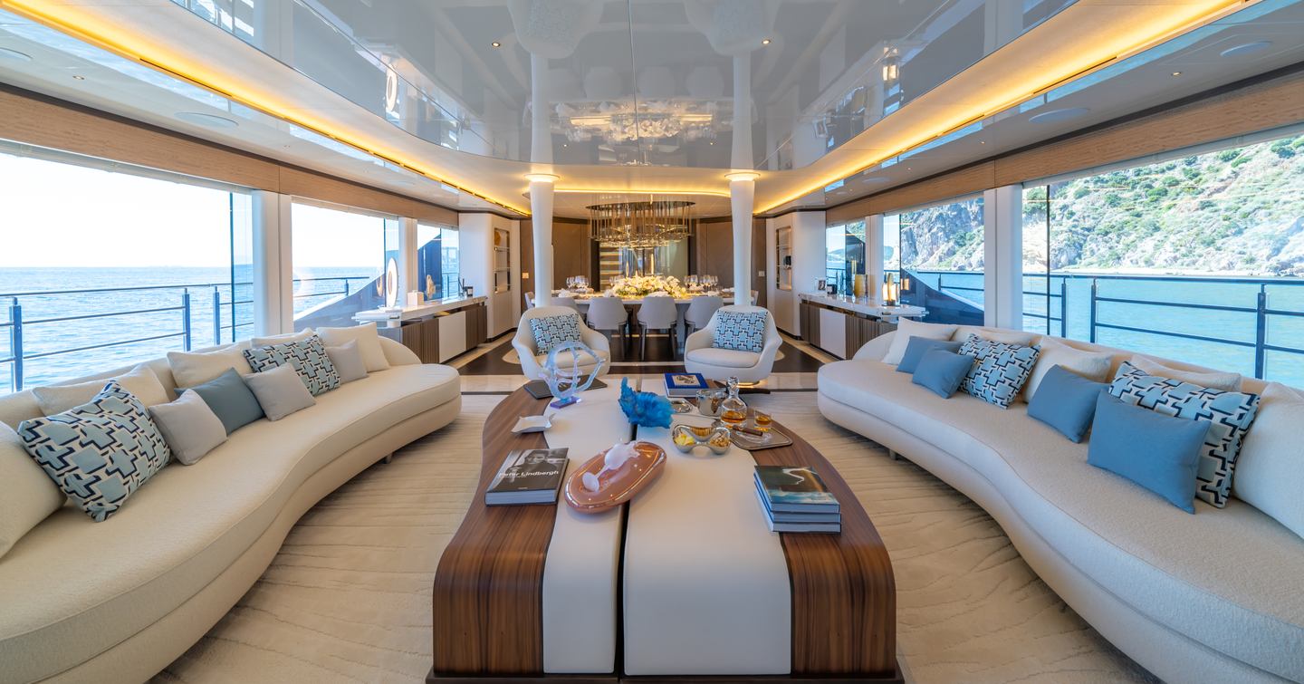 Bilgin 163 II Superyacht Camila main salon with wooden coffee table and dual white sofas 