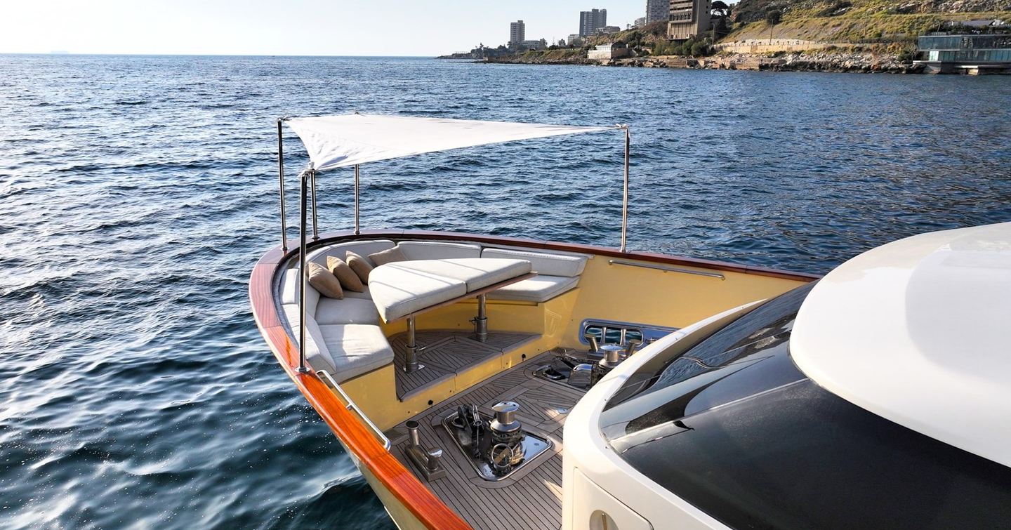 Motor yacht Lady Alina's bow with curved seating