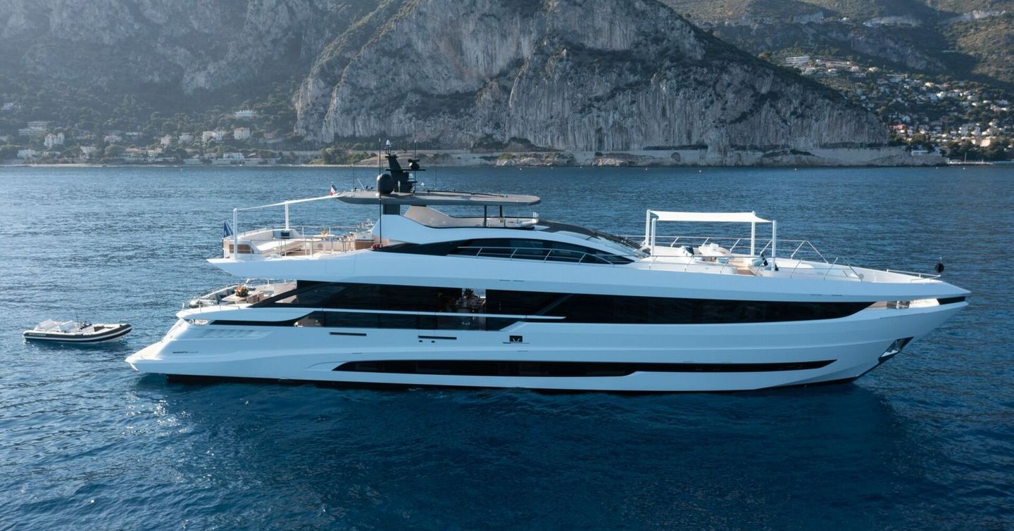 Mangusta GranSport 34 motor yacht at anchor with foredeck canopy 