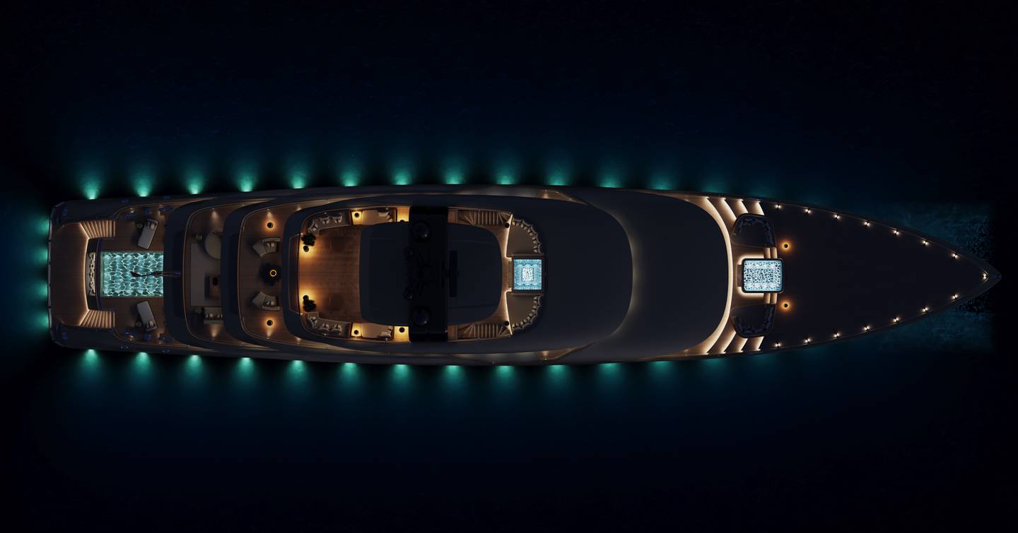 Aerial rendering of Alia 65M superyacht at anchor with underwater lights 
