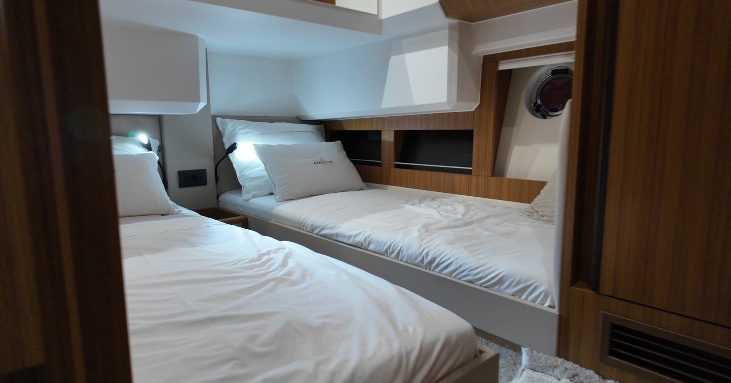 Greenline 42 guest cabin with twin single berths and side portlight