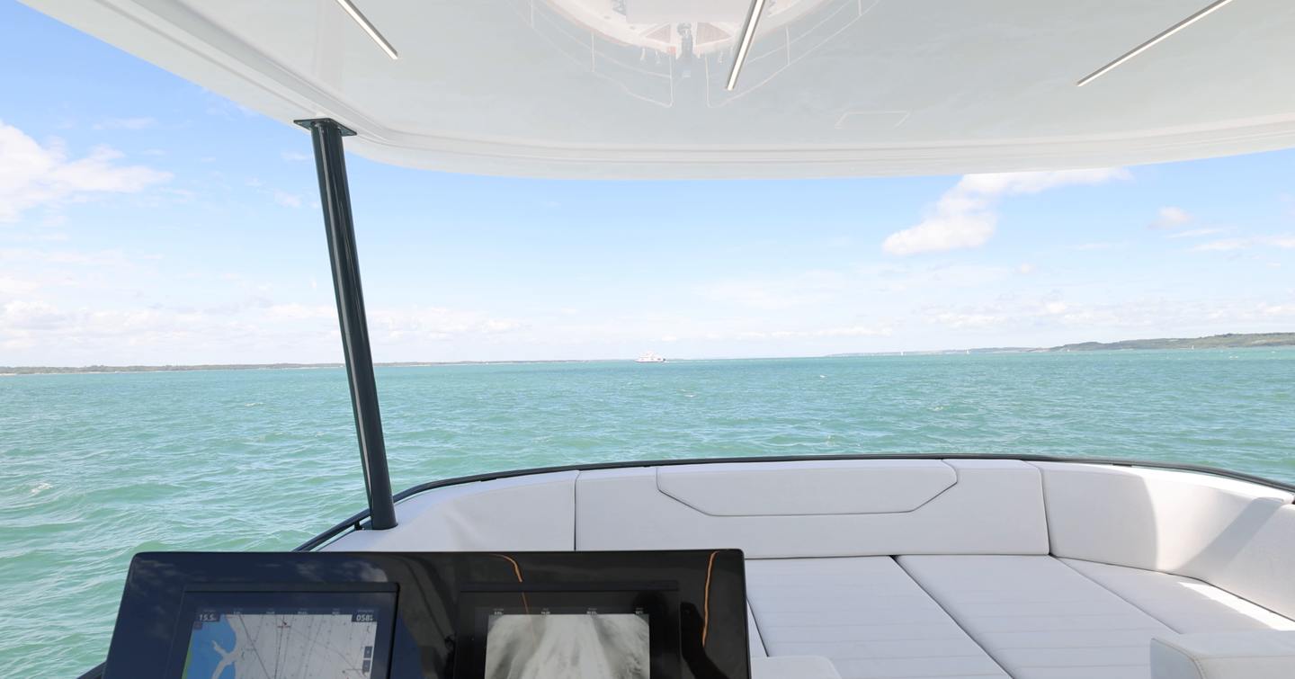 Sirena 48 flybridge helm view over the forward lounge and bow