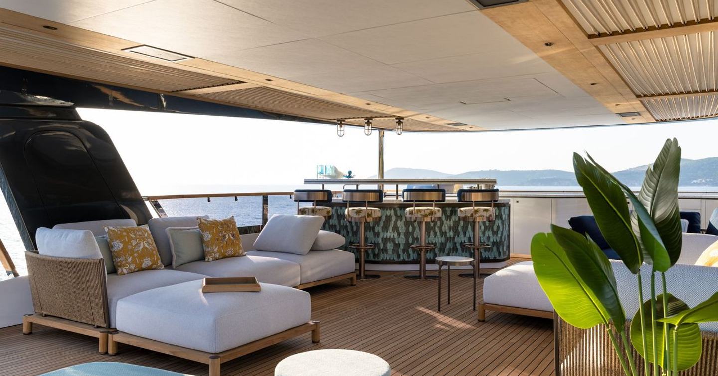 Sirena 118 Superyacht IKIGAI sundeck with bar area and shaded seating