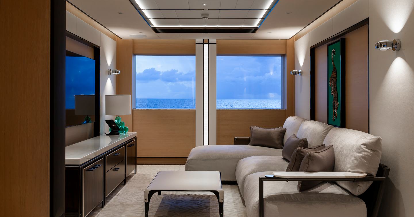 Superyacht Asia's VIP bedroom sofa and mounted TV