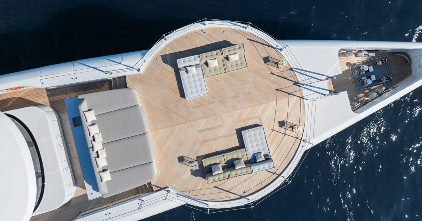Aerial view of Superyacht Silver Star I foredeck with dual L-shaped sofa