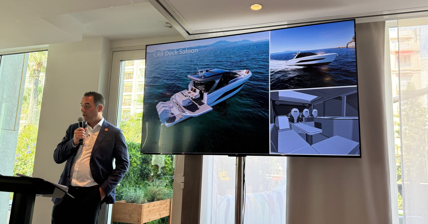 Speaker at Princess press conference at Cannes 2025 in front of new C48 slideshow