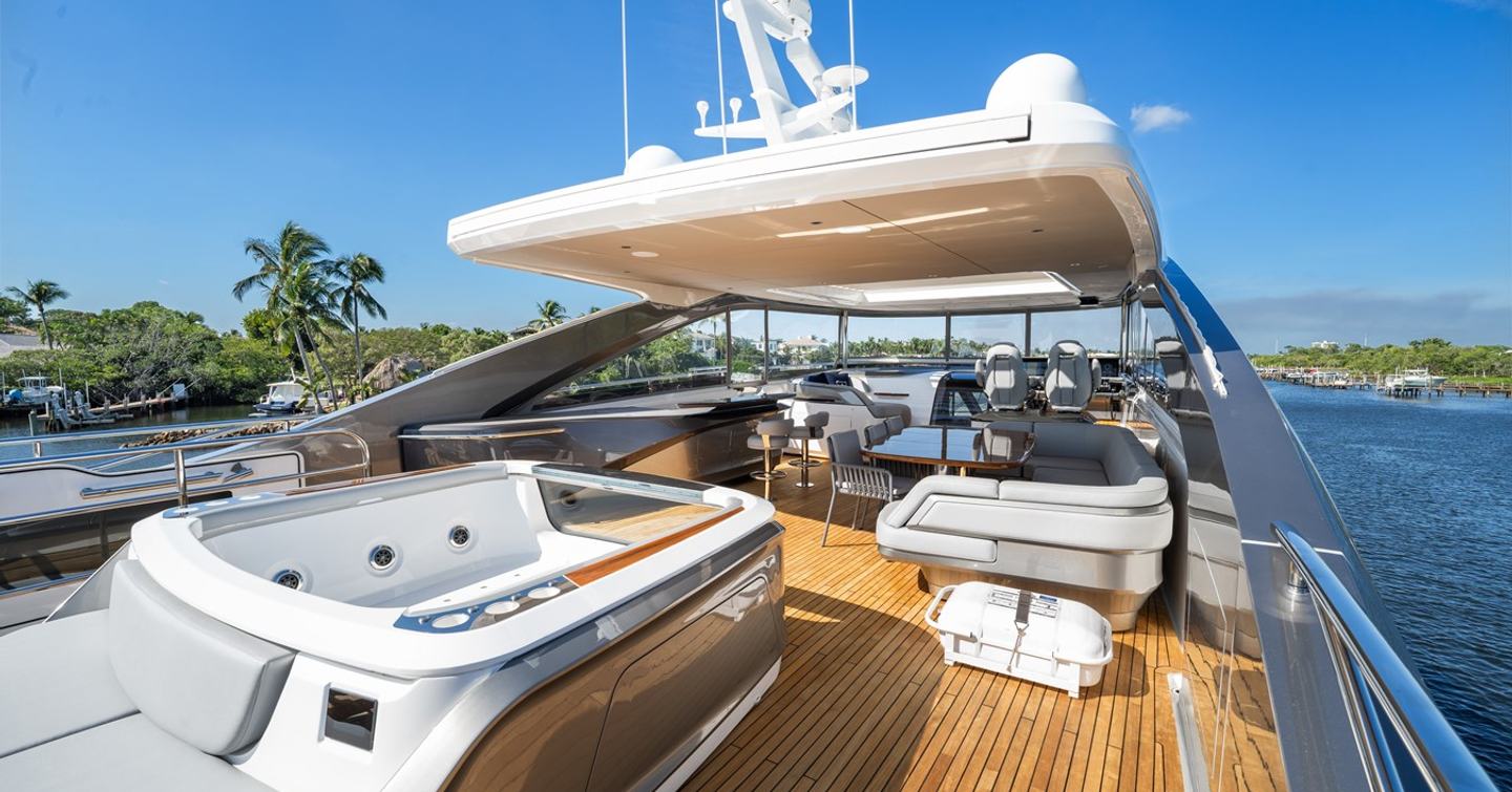 Princess Y95 Motor Yacht Just Perfect flybridge with empty jacuzzi and shaded seating