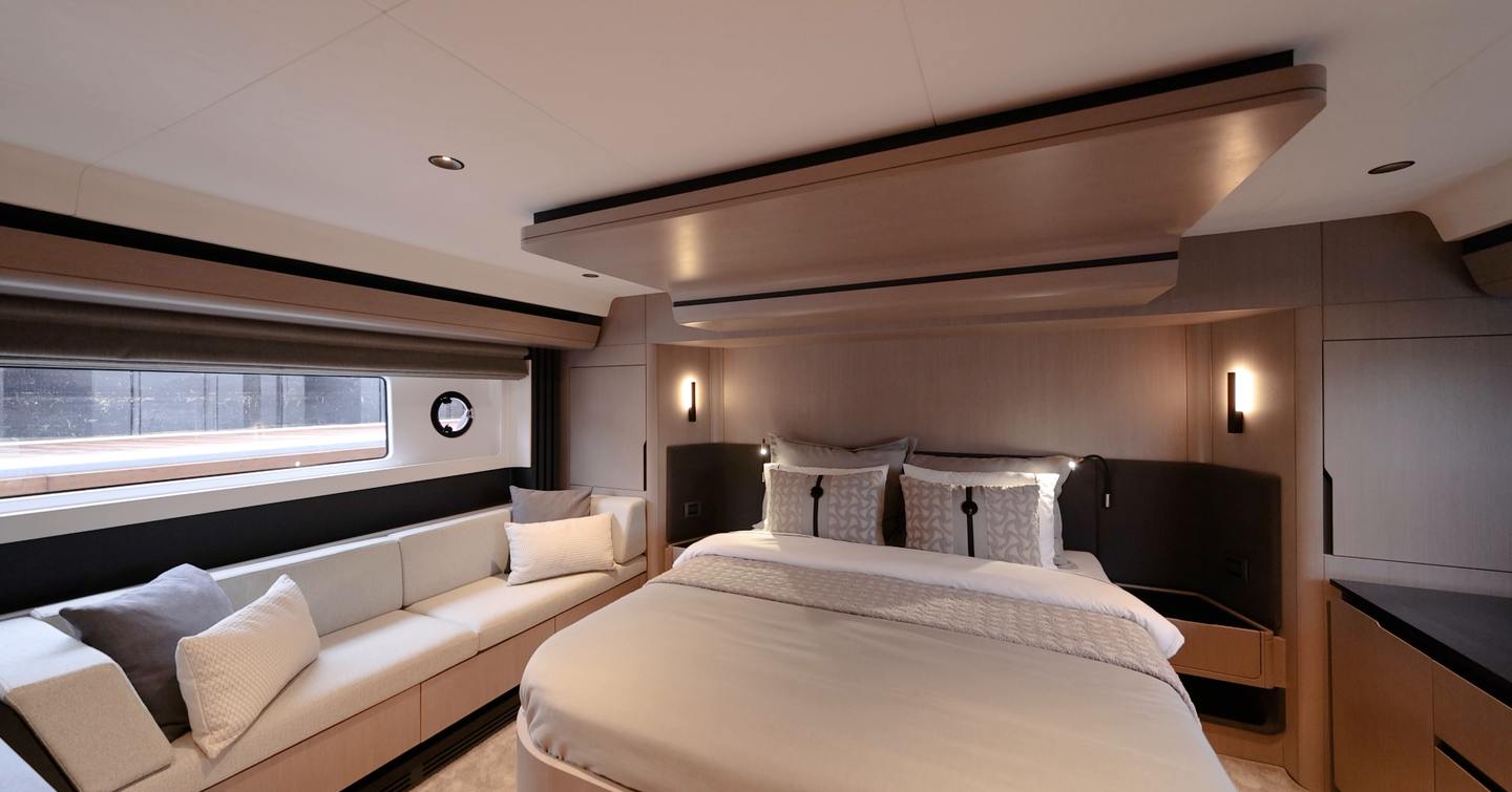 Sirena 48 owner’s cabin with double bed, sofa and hull window