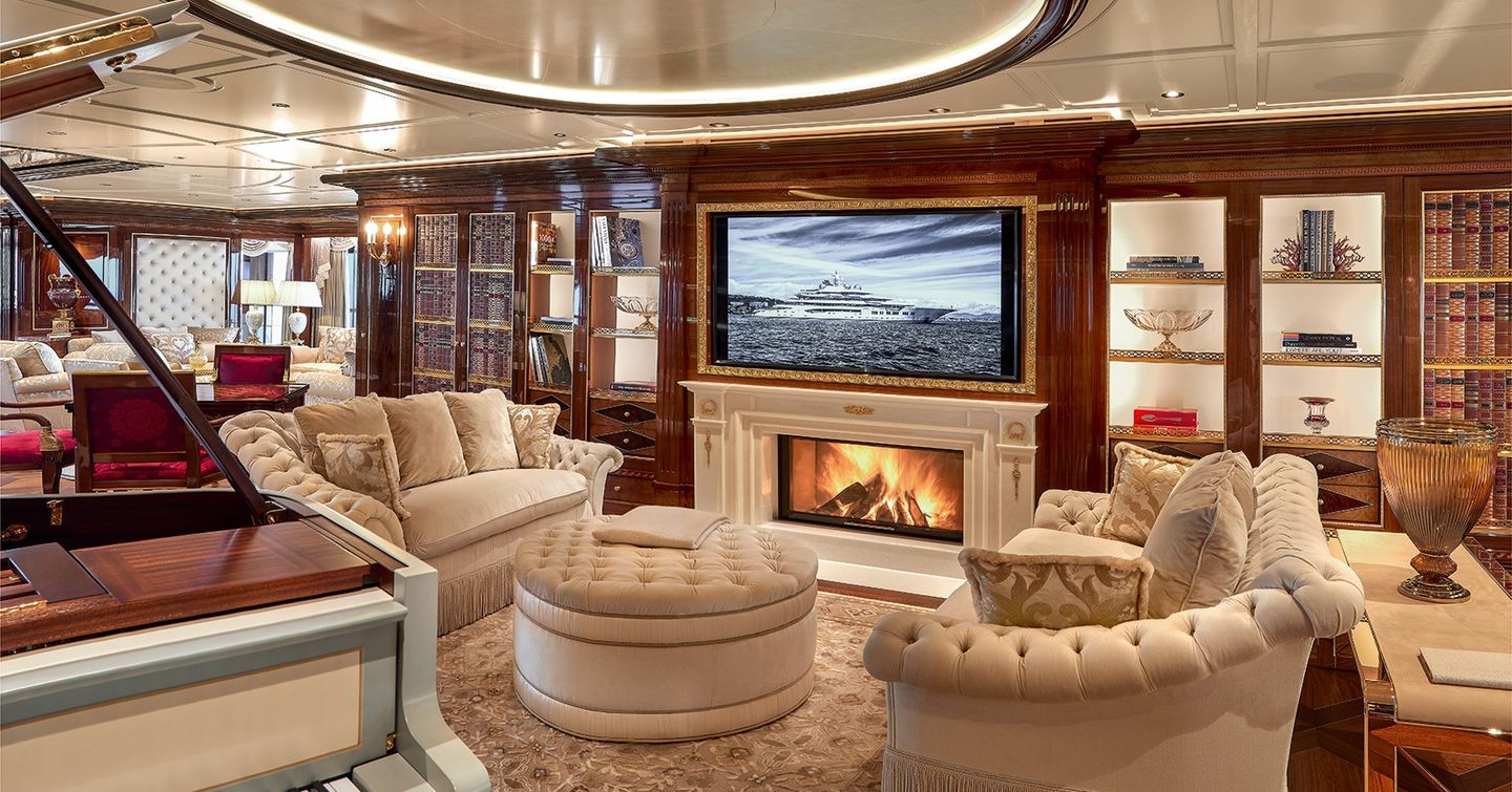 Piano and fireplace onboard superyacht Amadea