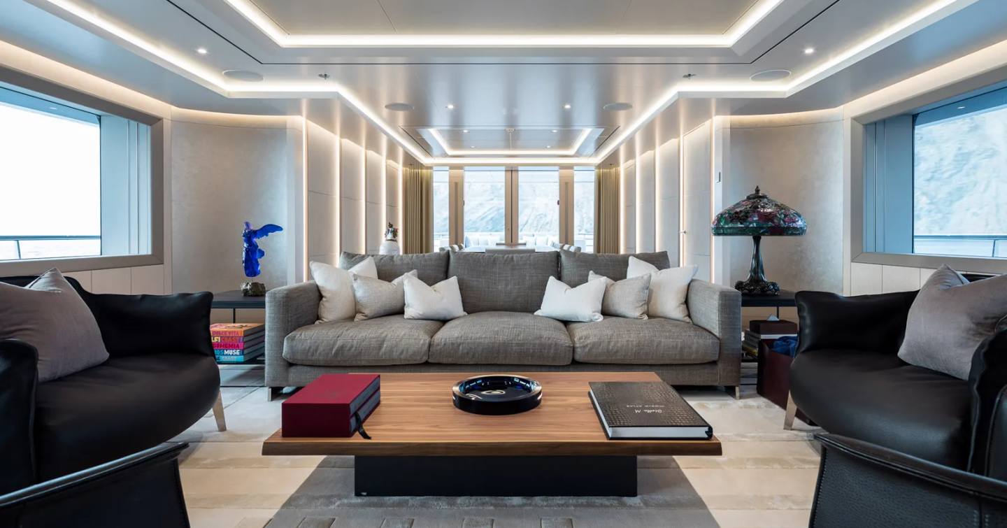 Superyacht Stella MI main saloon with grey sofa 