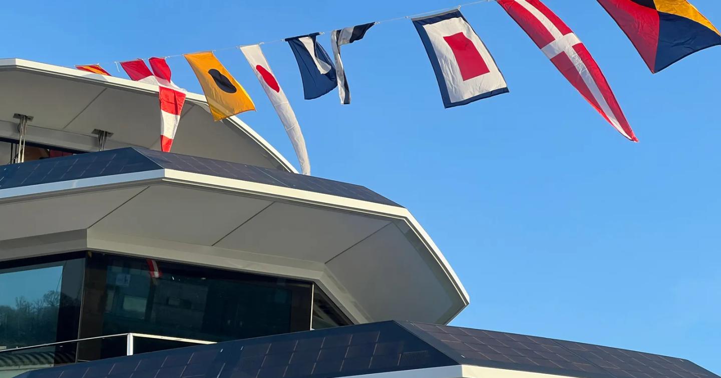 Close up of JFA Explorer 50m superyacht upper decks at launch with bunting