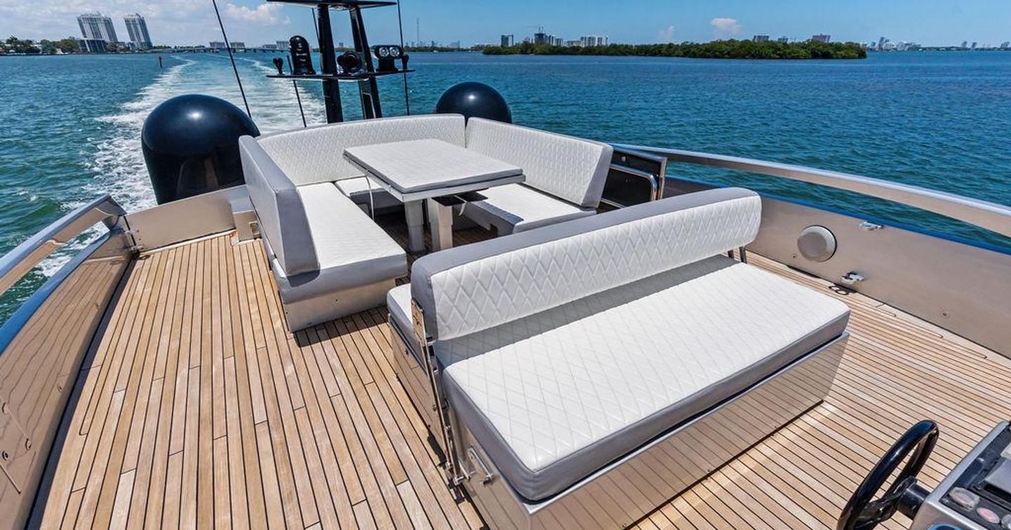 Pershing motor yacht Cersei sundeck with dining set up 