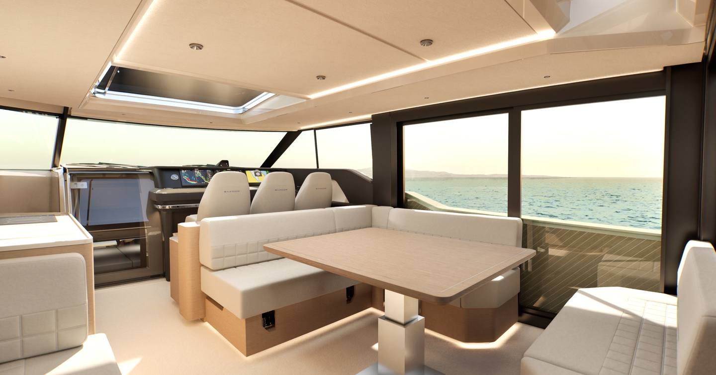 Saxdor 460 GTC boat interior with L-shaped sofa and helm station 