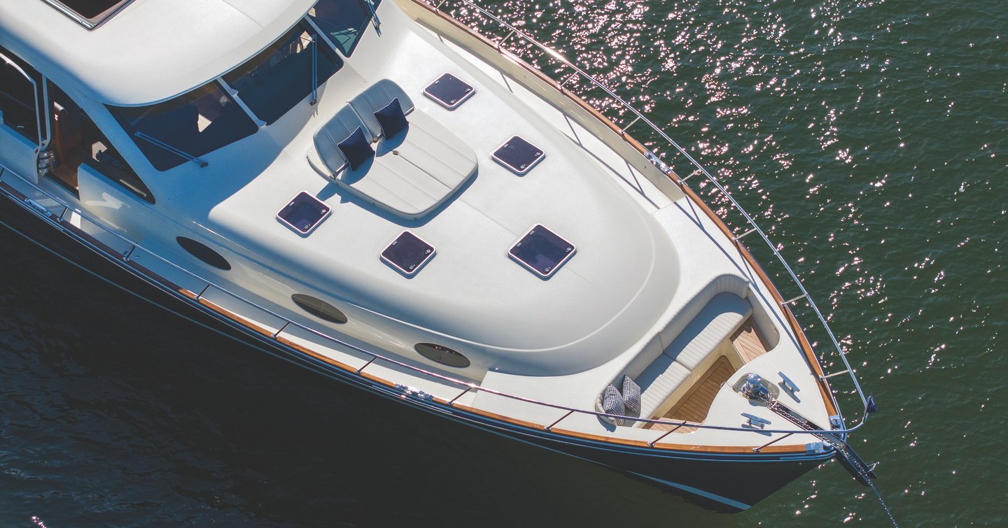 Aerial view of Palm Beach PB85 Sedan motor yacht foredeck with sunpads 
