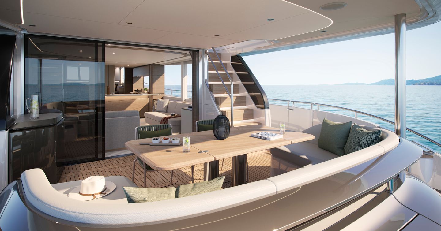 The main deck aft has an exterior dining area and a tender garage.