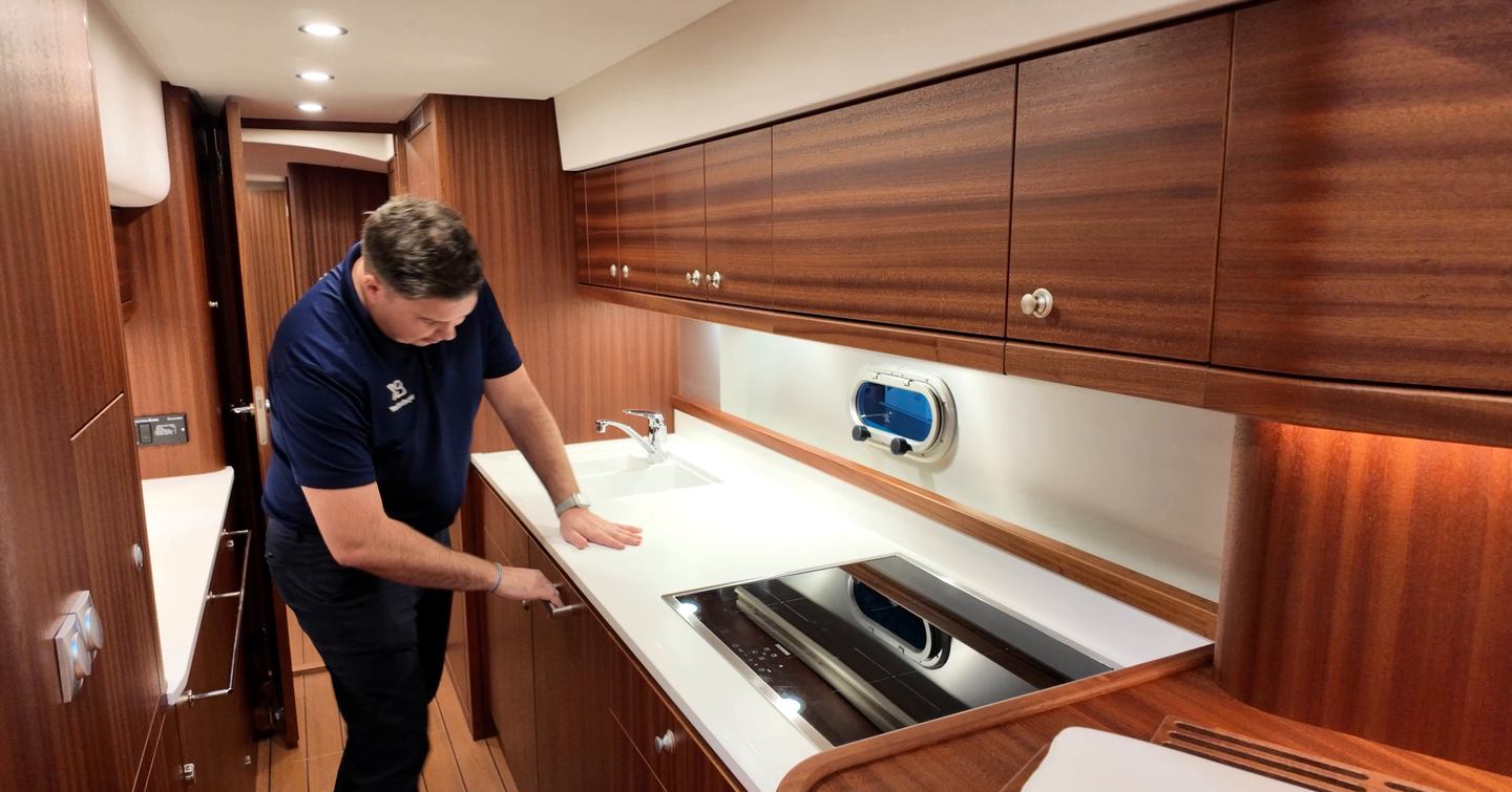 Elling E4 seagoing galley with induction hob and long countertop workspace