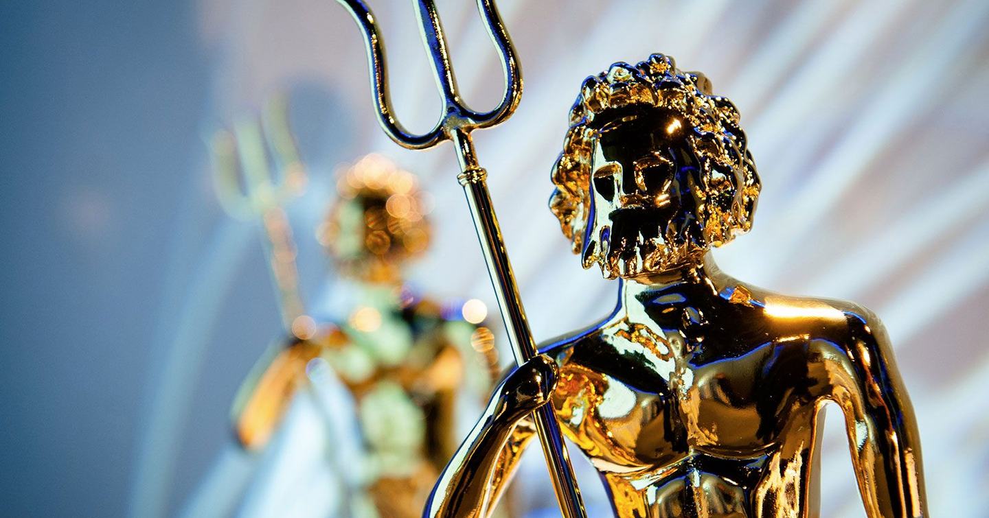 Close up of a Boat International Design & Innovation Awards trophy, looks like Poseidon.