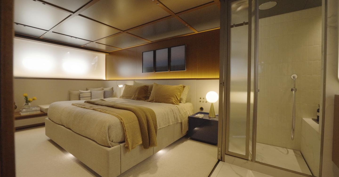Full-beam owner’s cabin on the Sanlorenzo SHE with king-size bed and en suite shower