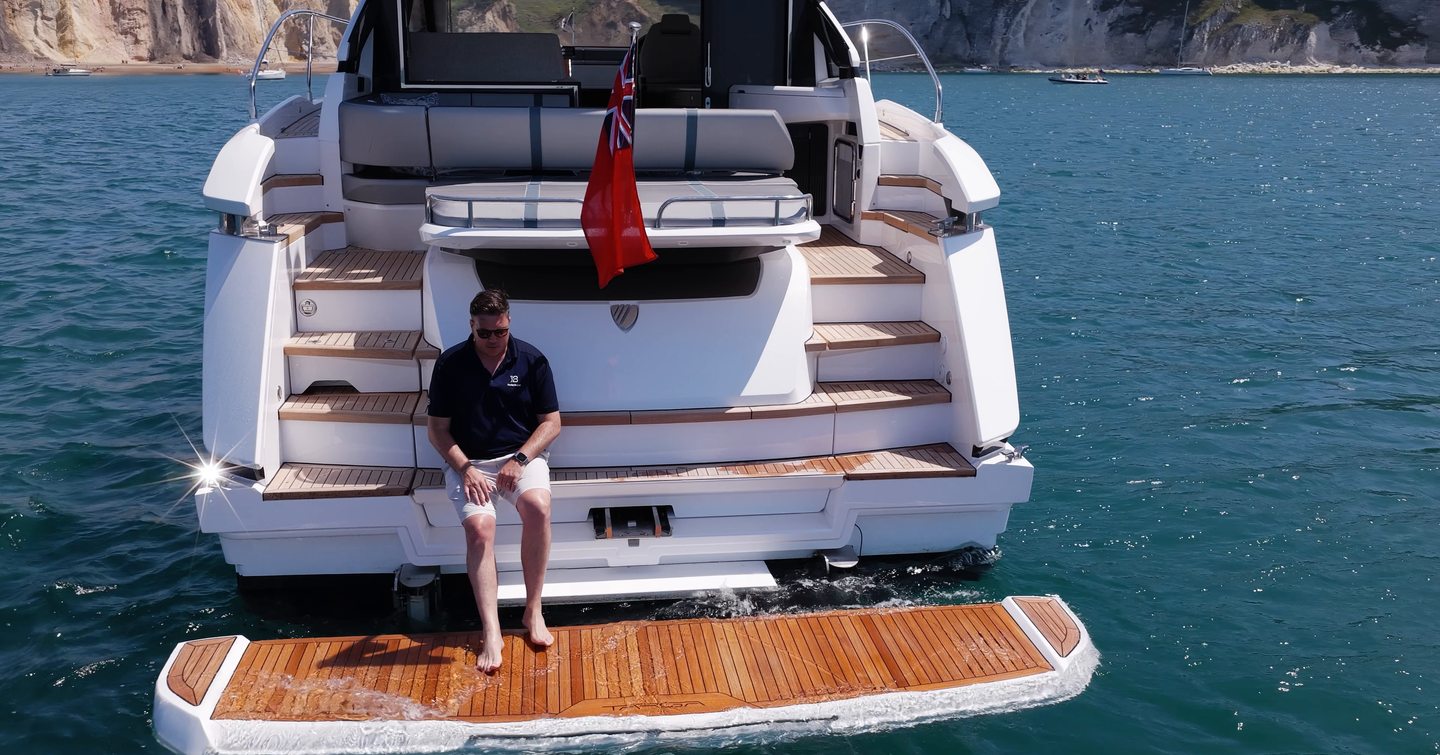 Fairline Targa 47 GT hydraulic bathing platform lowered for swimming at anchor