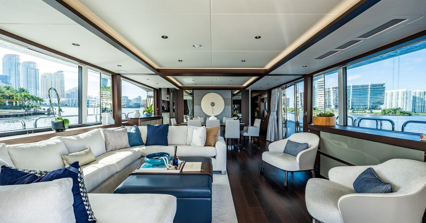 Motor yacht Mandala's main saloon with seating and coffee table