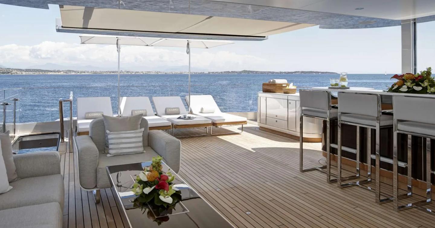 Superyacht Excellence V sundeck with shaded sun loungers