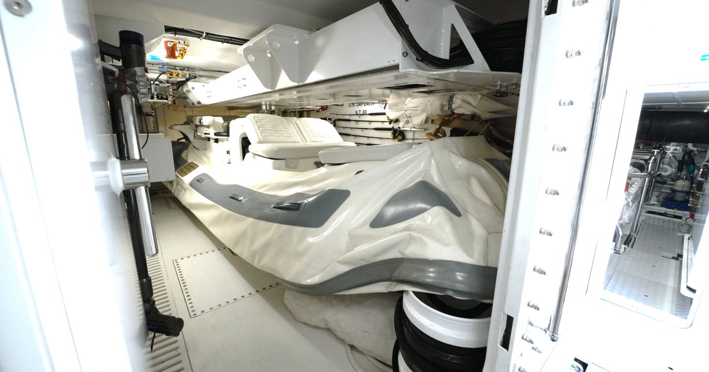 Benetti Oasis 34M side-loading tender garage housing a Williams 505 DieselJet and keeping the Oasis Deck clear for guest use.