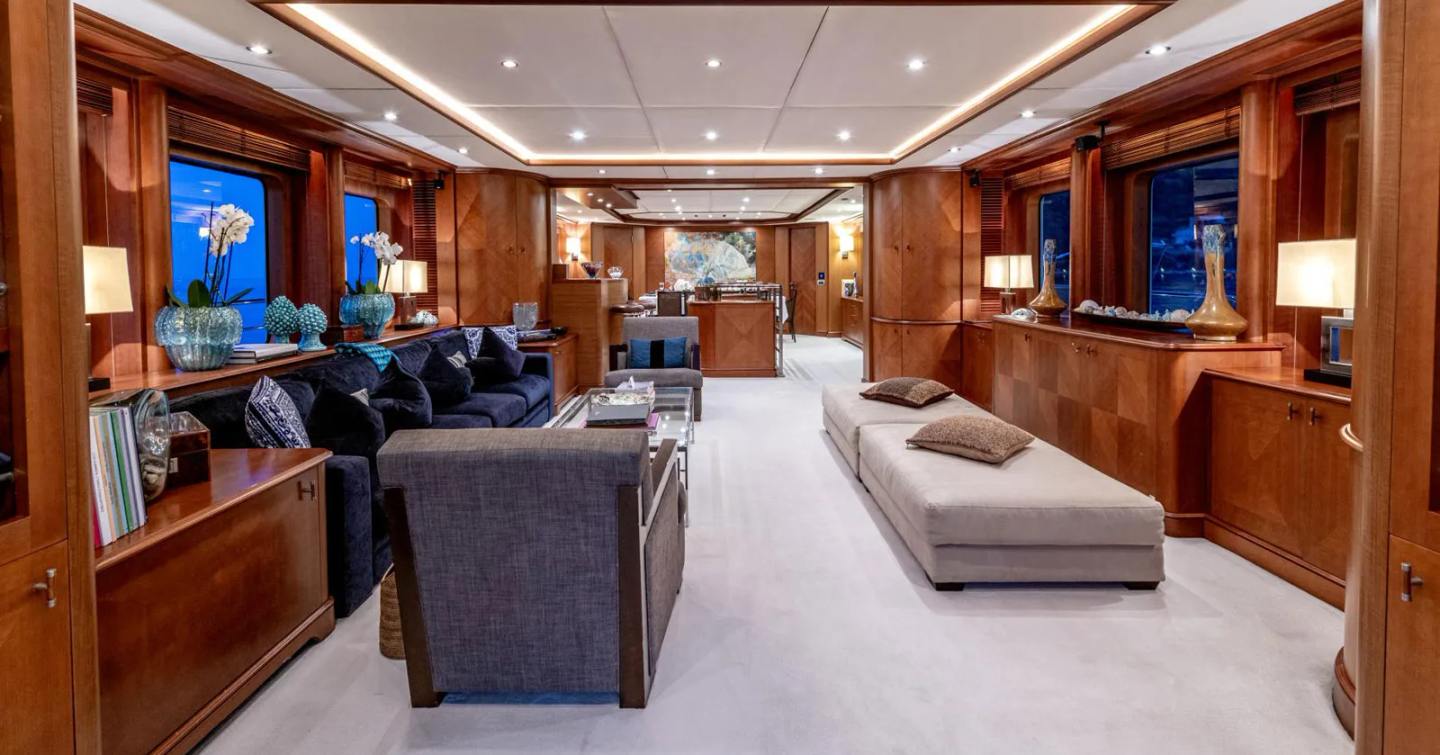 Superyacht Sea BlueZ main saloon with white sofa and glass coffee table 