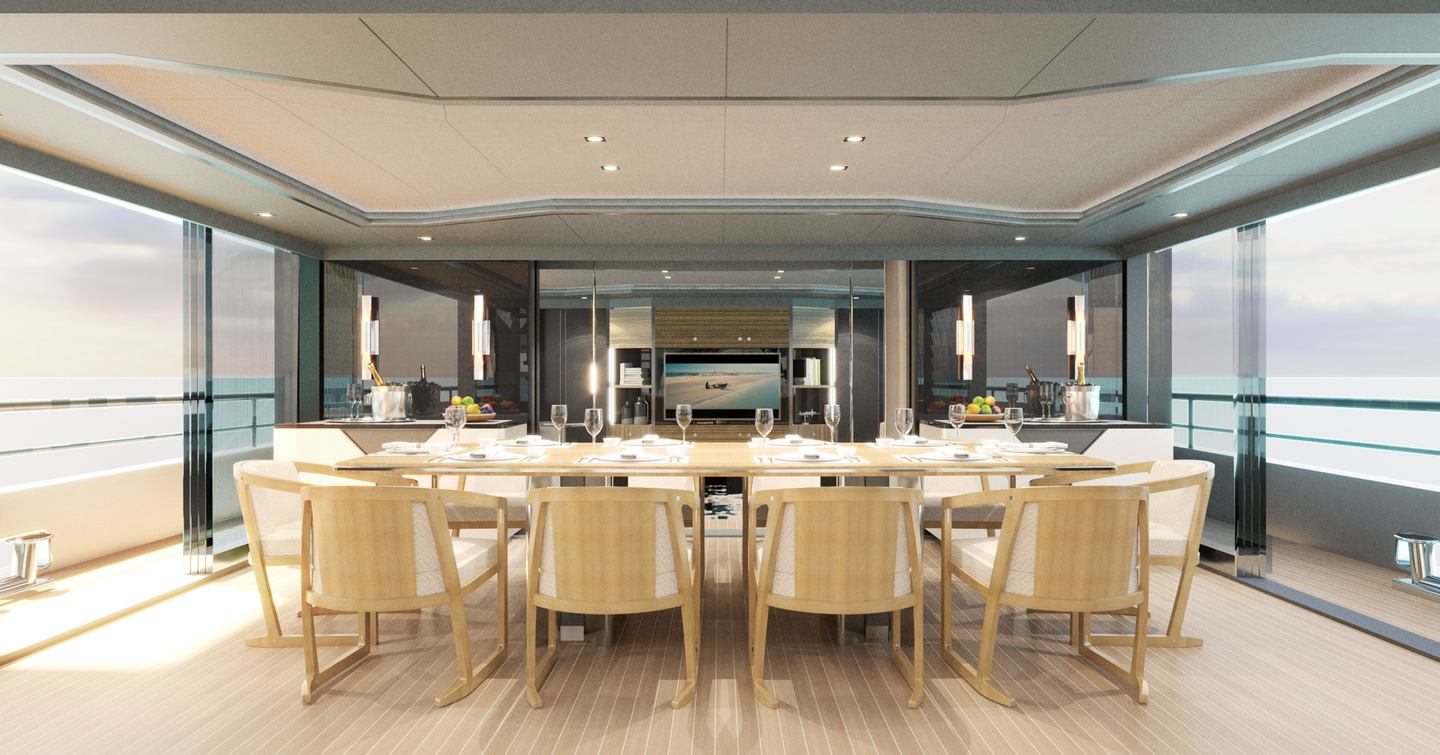 Dining area on motor yacht Spitfire with wooden modular chairs and a long table 