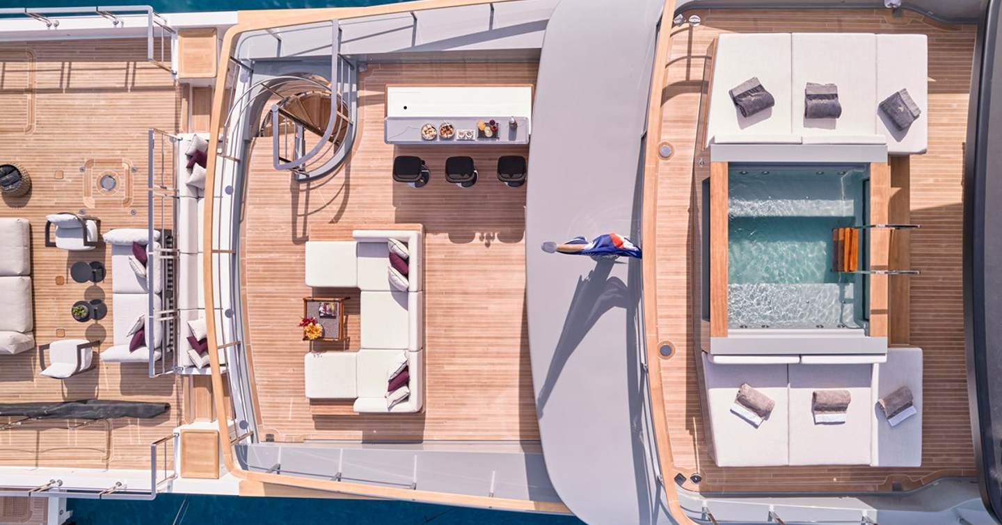 Aerial view of superyacht Para Bellum's aft decks with jacuzzi and sunpads 