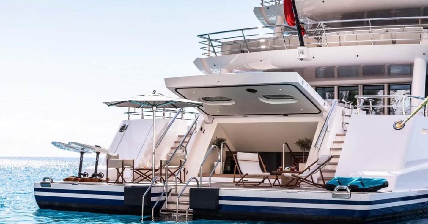 Superyacht Stella MI beach club with sun loungers and hydraulic stern