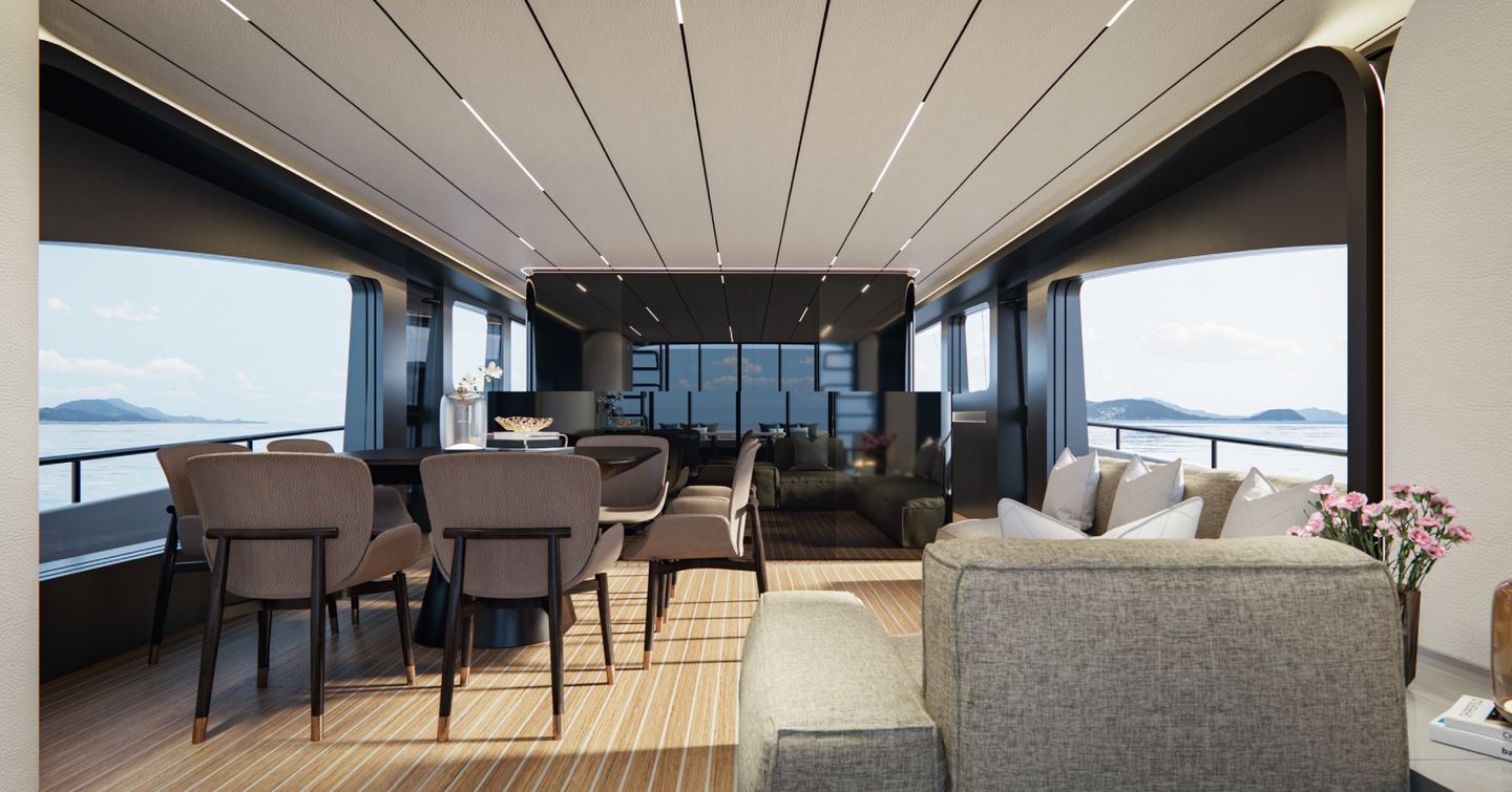 AB Yachts AB 95 superyacht main saloon with L-shaped sofa and dining area
