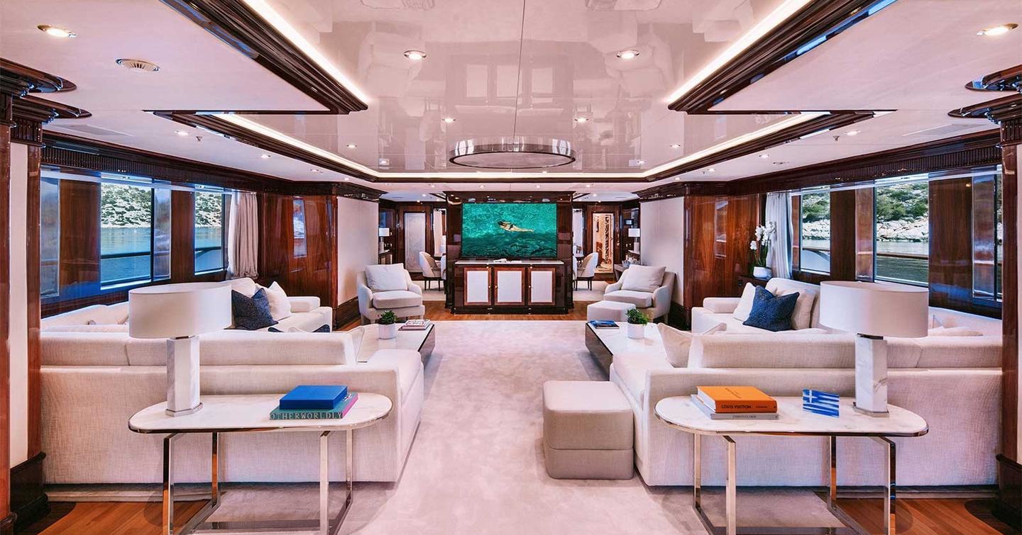 Superyacht IDyllic main saloon with dual L-shaped seating 