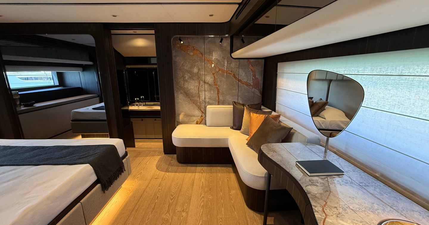 Ferretti-940-Review-owner-cabin-bed-and-lounge