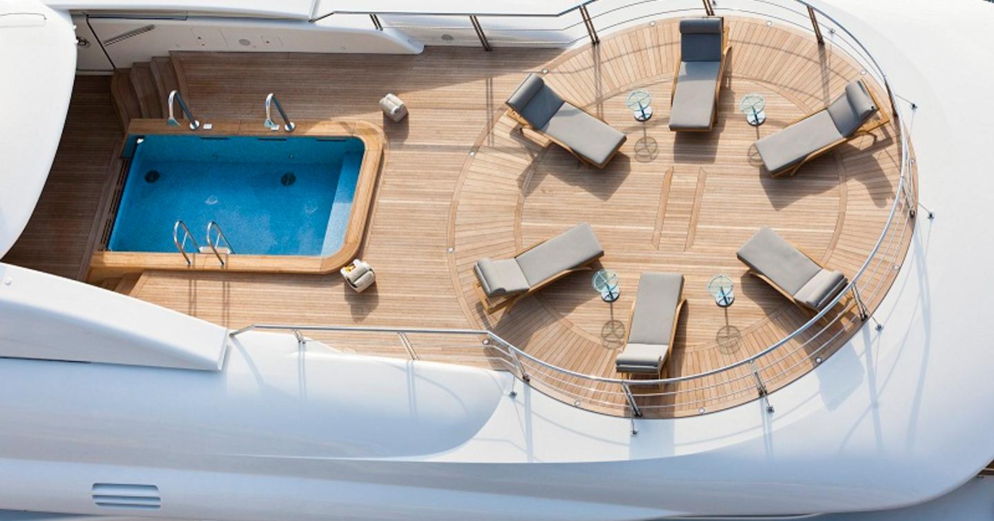 Superyacht High Power III upper deck with swimming pool and sun loungers