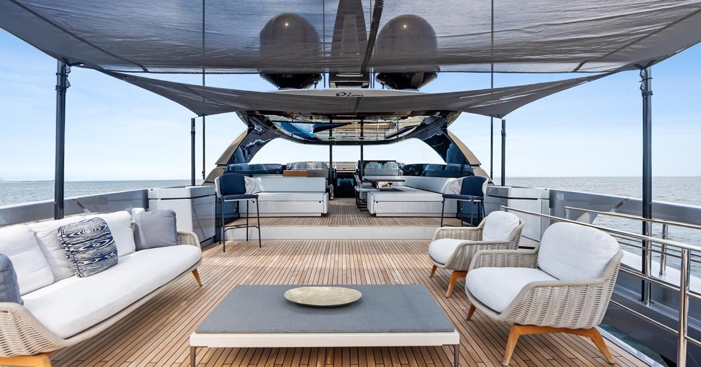 Superyacht Riva Royale flybridge with shaded seating and helm station