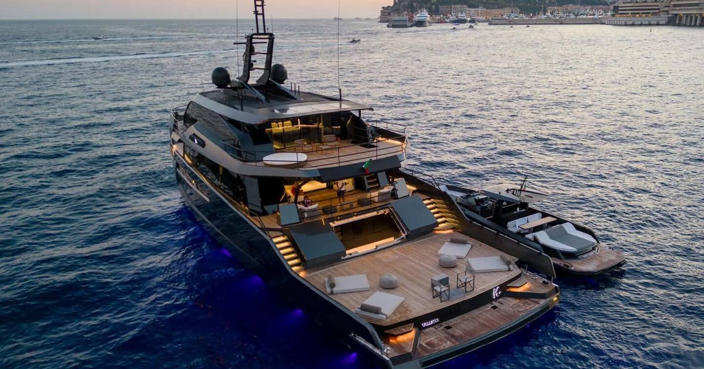  Superyacht K+  at dusk with beach deck