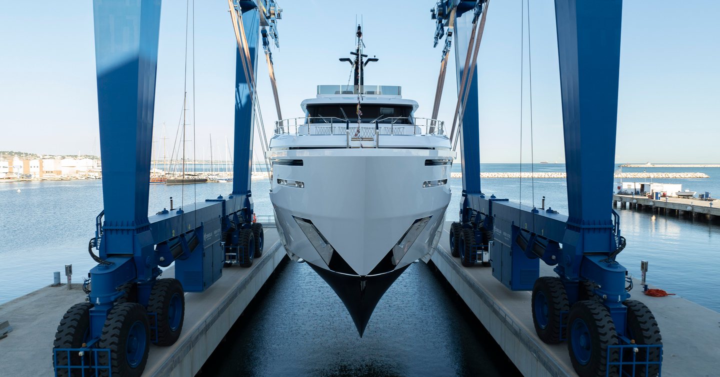 Custom Line Navetta 30 on the crane prior to launch