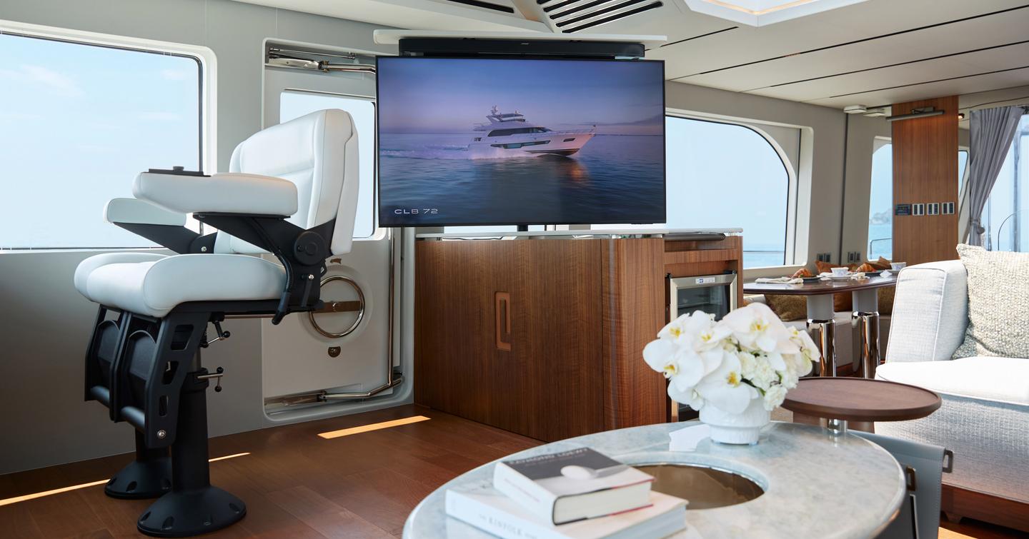 CL Yachts CLB65 SUV Motor Yacht helm station with marbled coffee table