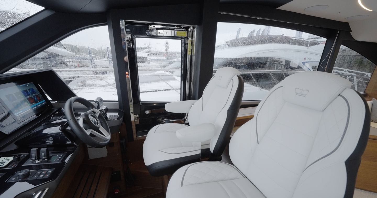 Princess S65 Mk2 lower helm seats with starboard side door and navigation controls