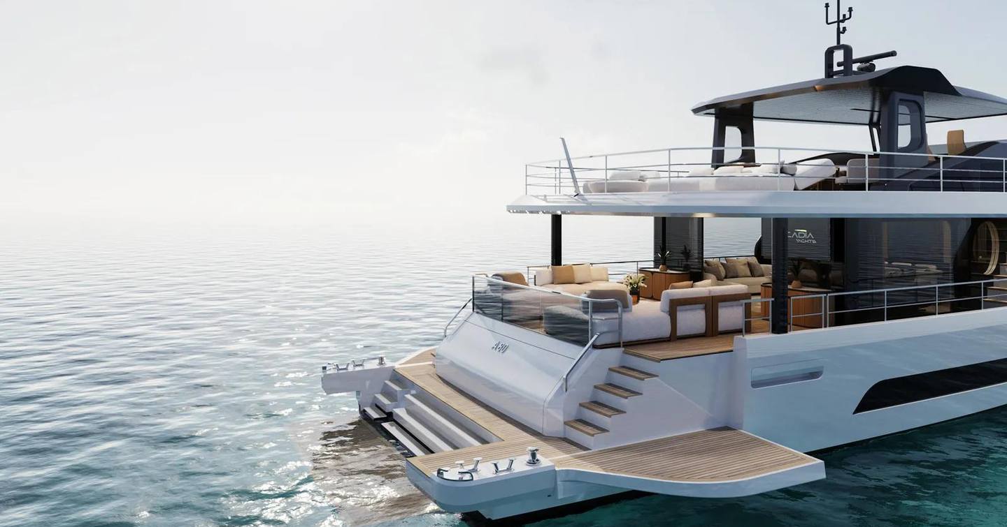 The aft deck of the A80 opens directly onto the sea with lounge seating and wide swim platform access.