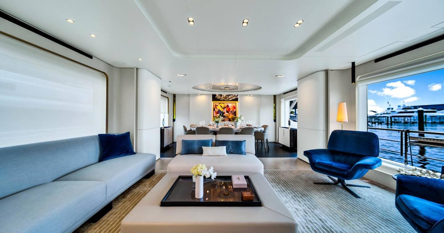 Superyacht One & Only main saloon with light blue furniture 