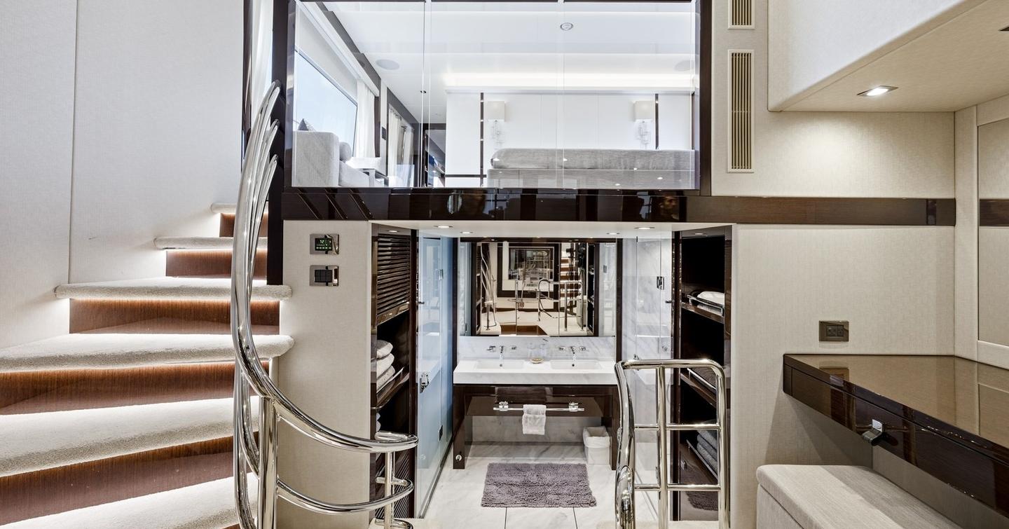 Pura Vida motor yacht first master cabin lower level with ensuite and desk area 