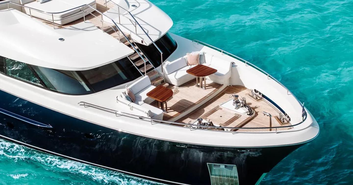 Superyacht Mustique's bow with sunpads and seating