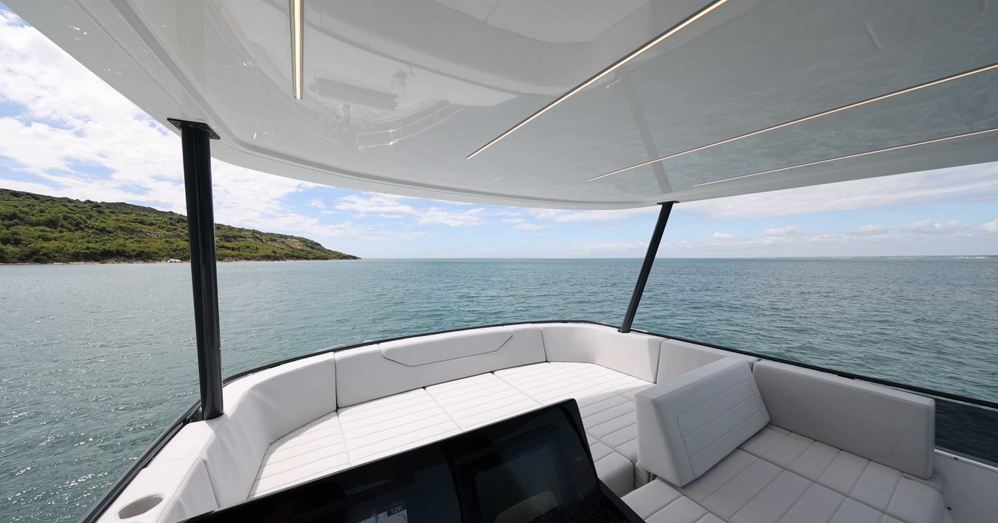 Sirena 48 forward flybridge lounge ahead of the helm